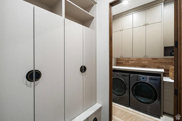 1040 S Summit Creek Dr, Woodland Hills, UT 84653 - laundry room featuring separate washer and dryer and cabinet space