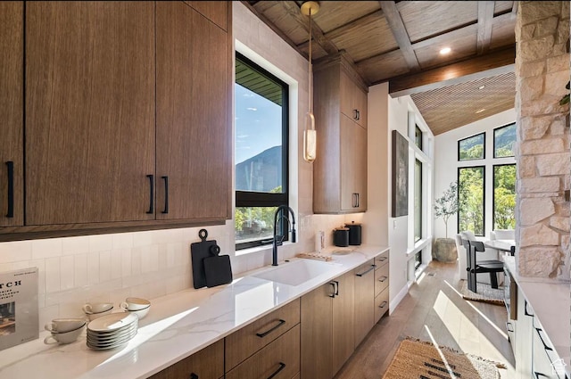 1040 S Summit Creek Dr, Woodland Hills, UT 84653 - kitchen featuring a sink, wooden ceiling, wood finished floors, healthy amount of natural light, and backsplash