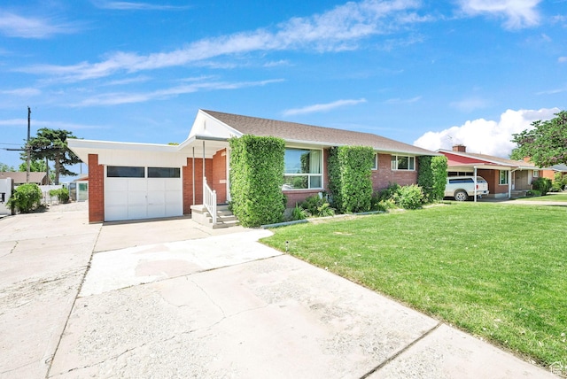 5151 S 2275 W, Roy, UT 84067 - ranch-style home featuring concrete driveway, a front lawn, an attached garage, and brick siding