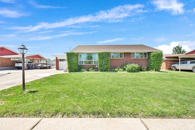 5151 S 2275 W, Roy, UT 84067 - ranch-style house featuring a front yard, concrete driveway, and an attached garage