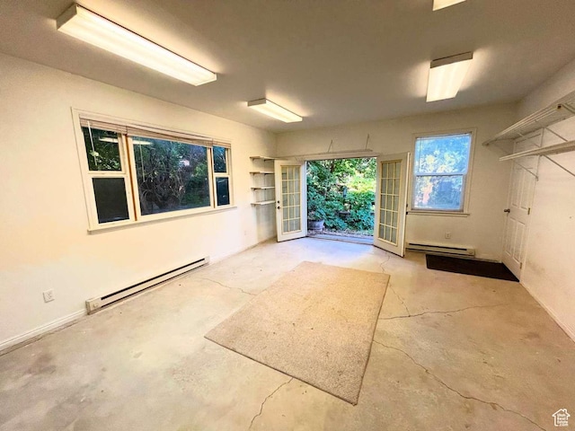 2326 E 1700 S, Salt Lake City, UT 84108 - empty room with a baseboard radiator and unfinished concrete flooring