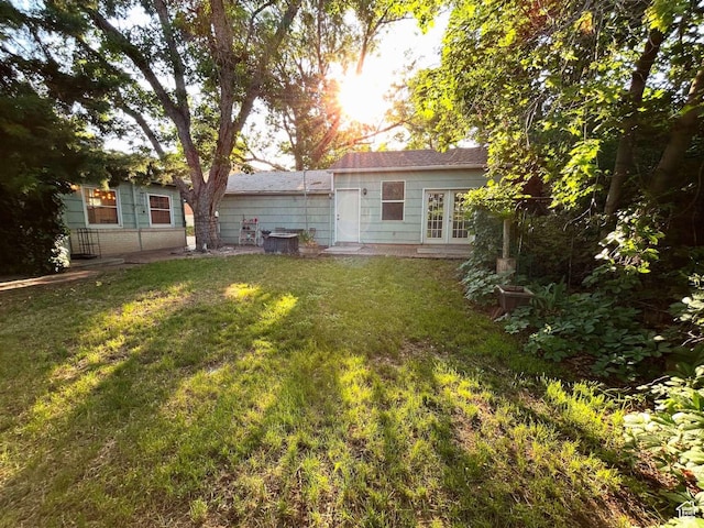 2326 E 1700 S, Salt Lake City, UT 84108 - back of house with a lawn and french doors