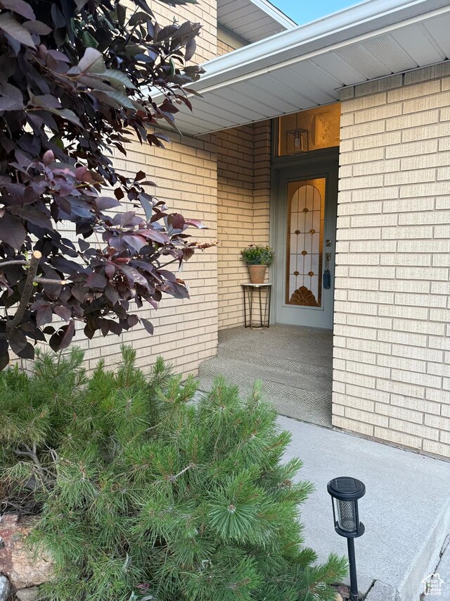 6209 W 9600 N, Highland, UT 84003 - doorway to property with brick siding