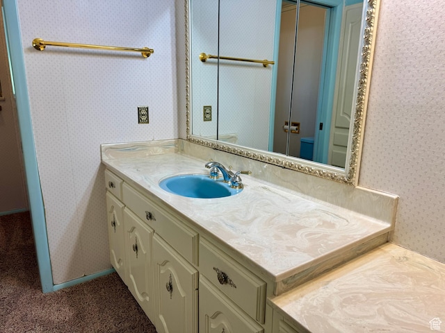 6209 W 9600 N, Highland, UT 84003 - bathroom with wallpapered walls, vanity, and toilet