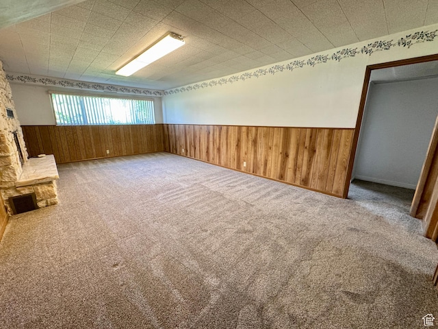 6209 W 9600 N, Highland, UT 84003 - unfurnished room featuring wood walls, a wainscoted wall, and carpet