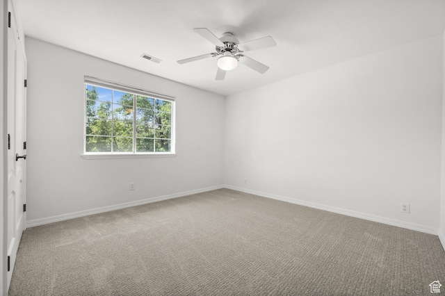 2607 E Cruise Bay Ct Unit 406, Cottonwood Heights, UT 84121 - spare room with baseboards, ceiling fan, and carpet