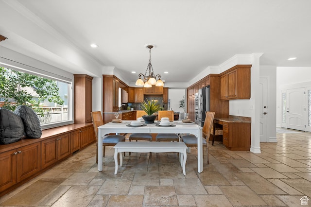 2607 E Cruise Bay Ct Unit 406, Cottonwood Heights, UT 84121 - dining room featuring stone tile flooring, recessed lighting, a chandelier, and crown molding