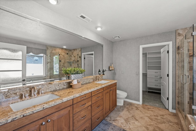 2607 E Cruise Bay Ct Unit 406, Cottonwood Heights, UT 84121 - full bath featuring double vanity, a stall shower, a spacious closet, and toilet