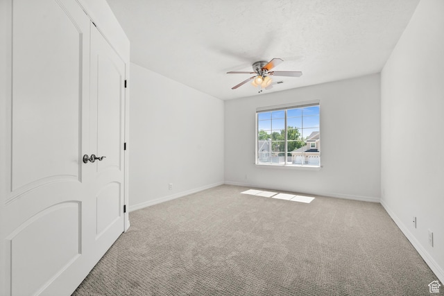 2607 E Cruise Bay Ct Unit 406, Cottonwood Heights, UT 84121 - carpeted spare room featuring a ceiling fan and baseboards