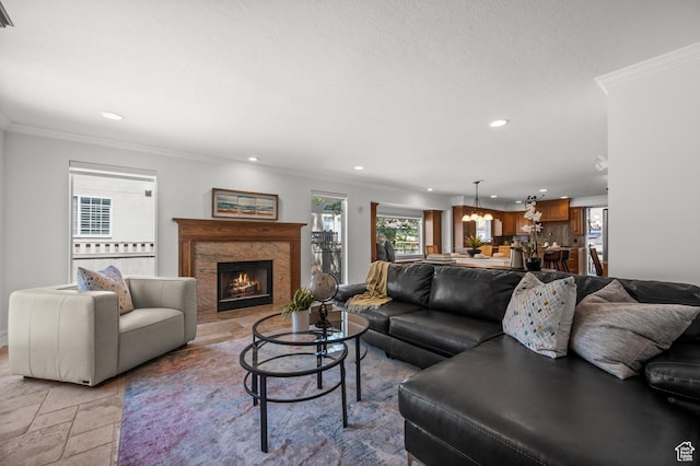 2607 E Cruise Bay Ct Unit 406, Cottonwood Heights, UT 84121 - living area featuring recessed lighting, ornamental molding, a fireplace, and stone tile floors