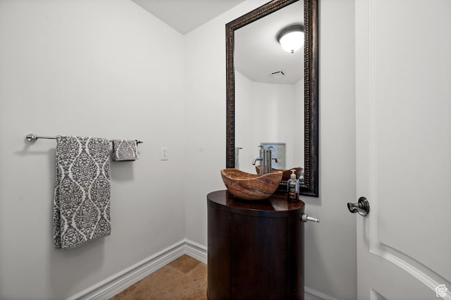 2607 E Cruise Bay Ct Unit 406, Cottonwood Heights, UT 84121 - bathroom with baseboards and vanity