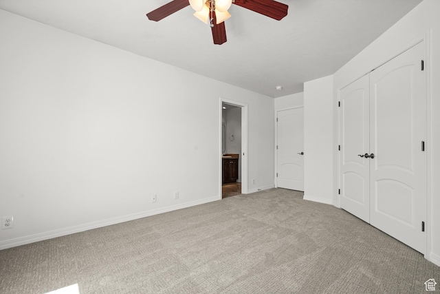 2607 E Cruise Bay Ct Unit 406, Cottonwood Heights, UT 84121 - unfurnished bedroom with carpet, baseboards, ensuite bath, a closet, and ceiling fan