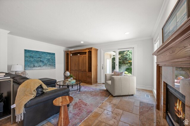 2607 E Cruise Bay Ct Unit 406, Cottonwood Heights, UT 84121 - living room with a fireplace, stone tile floors, crown molding, baseboards, and recessed lighting