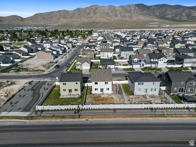 3493 N Sparrow Ln, Eagle Mountain, UT 84005 - aerial view of property and surrounding area with nearby suburban area and a mountain backdrop