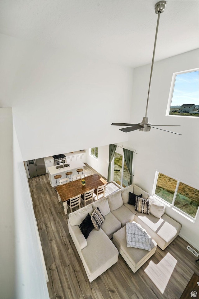 3493 N Sparrow Ln, Eagle Mountain, UT 84005 - living room featuring wood finished floors and ceiling fan