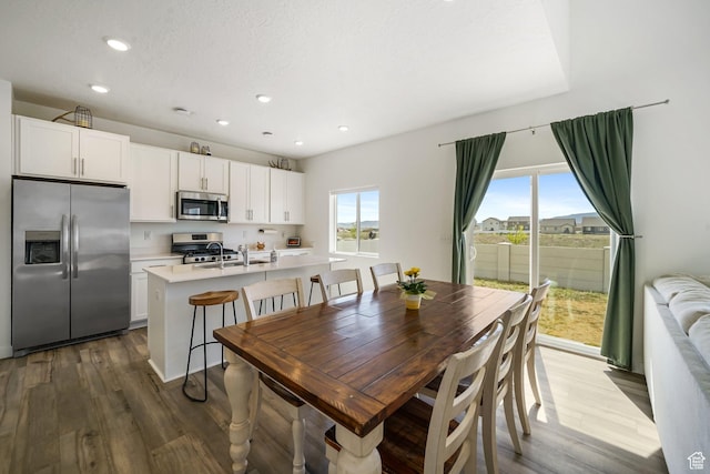 3493 N Sparrow Ln, Eagle Mountain, UT 84005 - dining room featuring dark wood-type flooring and recessed lighting