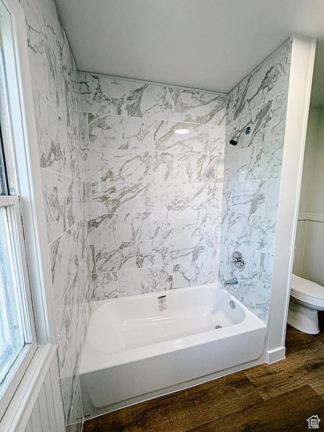 1516 E 36th, Ogden, UT 84403 - full bathroom with wood finished floors, toilet, shower / washtub combination, and radiator heating unit