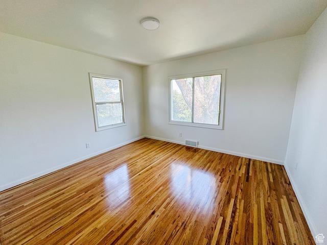 1516 E 36th, Ogden, UT 84403 - empty room with wood finished floors and baseboards