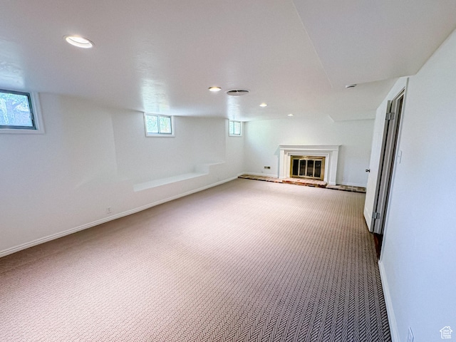 1516 E 36th, Ogden, UT 84403 - basement with carpet flooring, recessed lighting, a glass covered fireplace, and baseboards