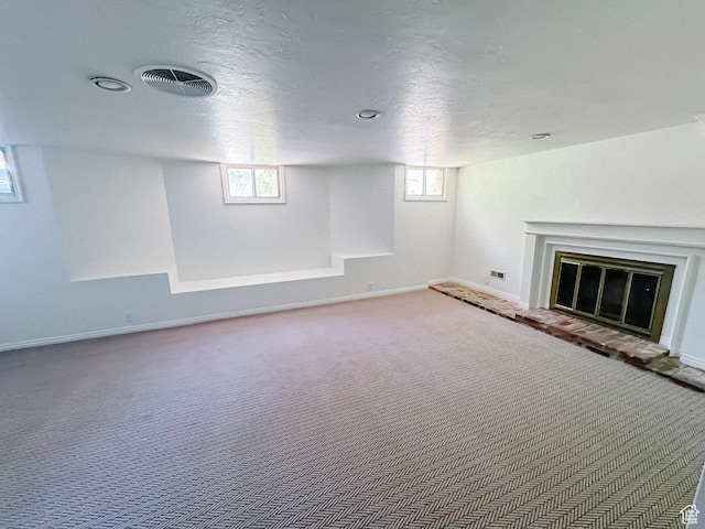 1516 E 36th, Ogden, UT 84403 - basement featuring baseboards, a glass covered fireplace, and carpet flooring