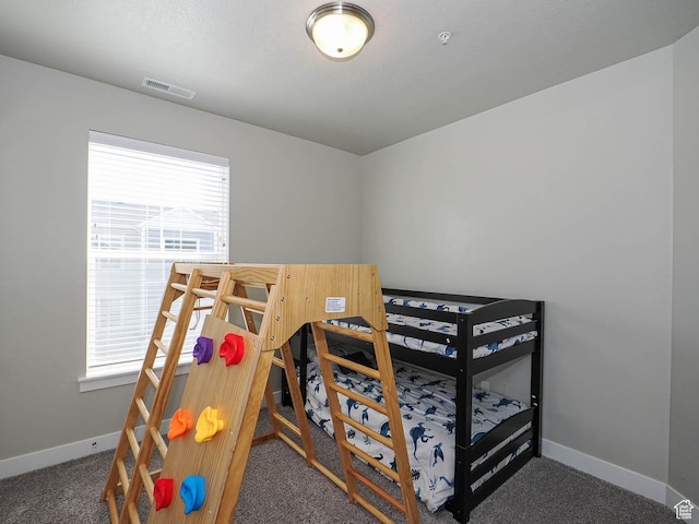 14654 S Bloom Dr W Unit K 304, Herriman, UT 84096 - bedroom with carpet flooring and baseboards