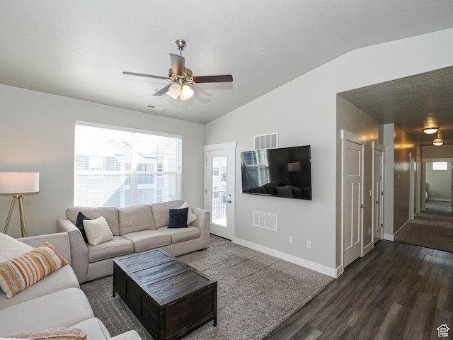 14654 S Bloom Dr W Unit K 304, Herriman, UT 84096 - living room featuring dark wood-style floors, ceiling fan, lofted ceiling, plenty of natural light, and baseboards