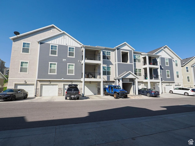 14654 S Bloom Dr W Unit K 304, Herriman, UT 84096 - view of building exterior featuring a garage