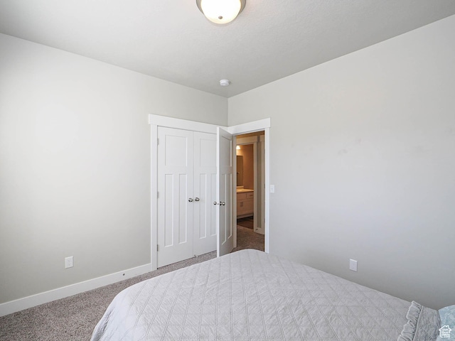 14654 S Bloom Dr W Unit K 304, Herriman, UT 84096 - bedroom featuring carpet, baseboards, and a closet