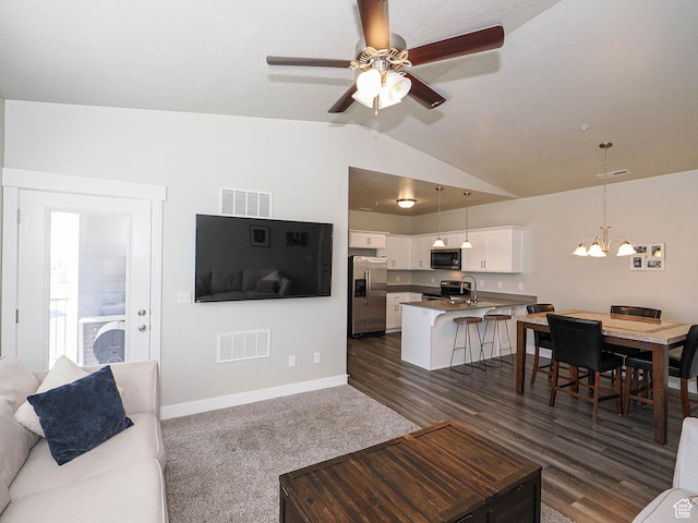 14654 S Bloom Dr W Unit K 304, Herriman, UT 84096 - living area with a chandelier, lofted ceiling, a ceiling fan, and baseboards