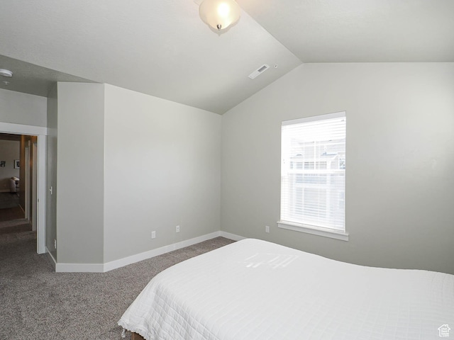 14654 S Bloom Dr W Unit K 304, Herriman, UT 84096 - carpeted bedroom with vaulted ceiling and baseboards