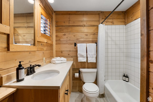 3057 E Balsam Rd, Sundance, UT 84604 - full bathroom featuring toilet, vanity, wood walls, shower / bath combo, and tile patterned floors