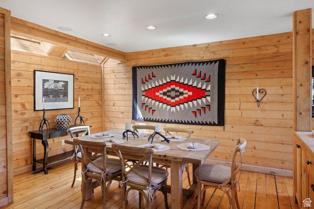 3057 E Balsam Rd, Sundance, UT 84604 - dining room with wooden walls, light wood-type flooring, recessed lighting, and a skylight