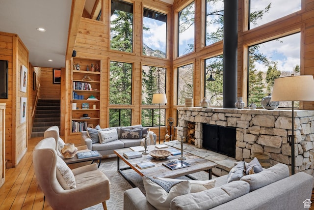 3057 E Balsam Rd, Sundance, UT 84604 - living room with recessed lighting, plenty of natural light, wood-type flooring, stairway, and a fireplace