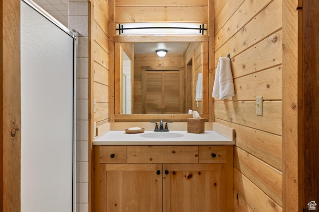 3057 E Balsam Rd, Sundance, UT 84604 - bathroom featuring wooden walls, vanity, and a stall shower