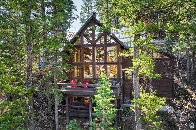 3057 E Balsam Rd, Sundance, UT 84604 - rear view of house with metal roof, a standing seam roof, and a wooden deck