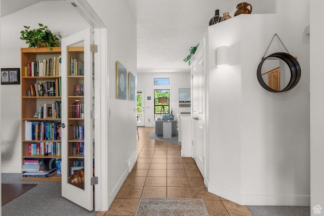 2193 E Robie Hill Ln, Millcreek, UT 84109 - hall with baseboards and tile patterned flooring