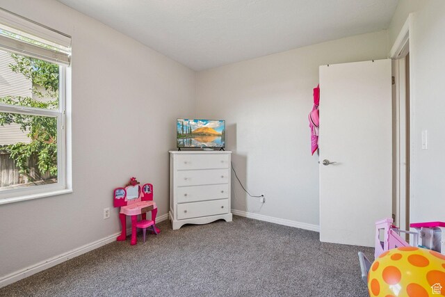 8962 S Altair Dr, Sandy, UT 84093 - recreation room with carpet and baseboards