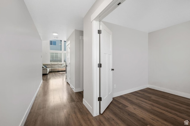 12364 S Boggs Way, Herriman, UT 84096 - hall with dark wood-type flooring and baseboards