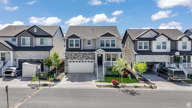 12364 S Boggs Way, Herriman, UT 84096 - view of property featuring concrete driveway, a residential view, stone siding, an attached garage, and board and batten siding