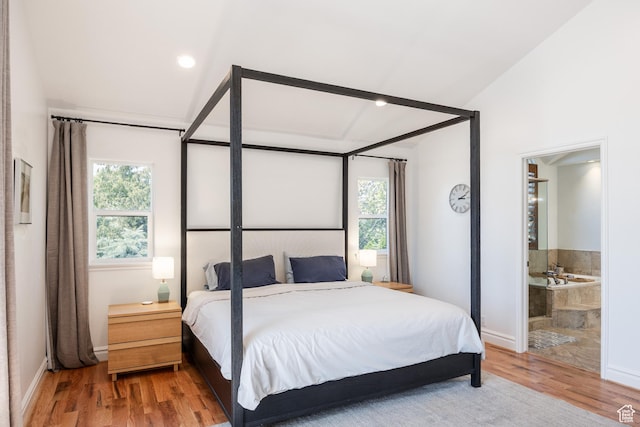 1877 E 3990 S, Holladay, UT 84124 - bedroom with multiple windows, wood finished floors, baseboards, and lofted ceiling