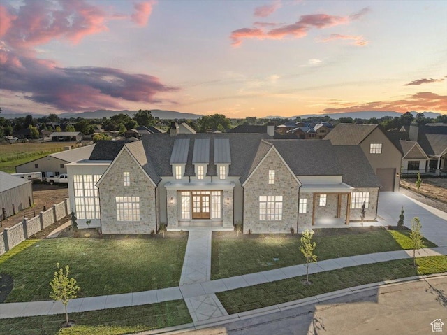 478 S Maple Lakes Dr, Mapleton, UT 84664 - view of front of property featuring french doors, driveway, a residential view, a garage, and stone siding