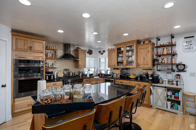 4962 S 5050 W, Hooper, UT 84315 - kitchen featuring open shelves, wall chimney range hood, double oven, decorative backsplash, and recessed lighting