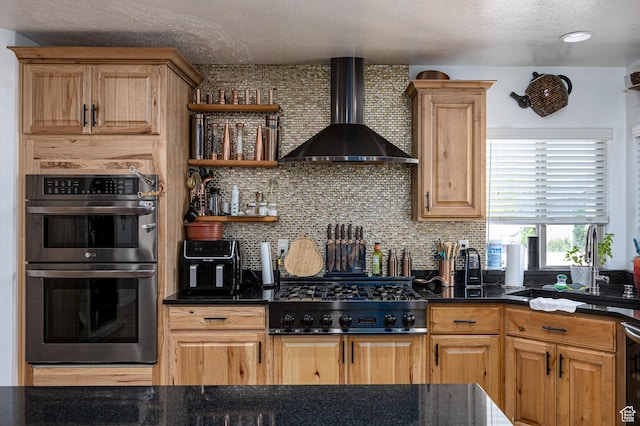 4962 S 5050 W, Hooper, UT 84315 - kitchen with wall chimney range hood, double oven, gas cooktop, backsplash, and a textured ceiling