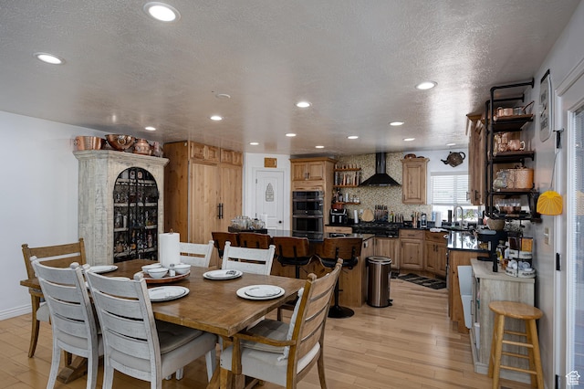 4962 S 5050 W, Hooper, UT 84315 - dining area featuring light wood finished floors, recessed lighting, and a textured ceiling