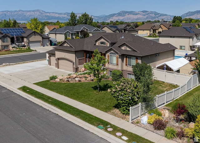 4962 S 5050 W, Hooper, UT 84315 - view of front of home with a residential view, concrete driveway, stucco siding, and a mountain view