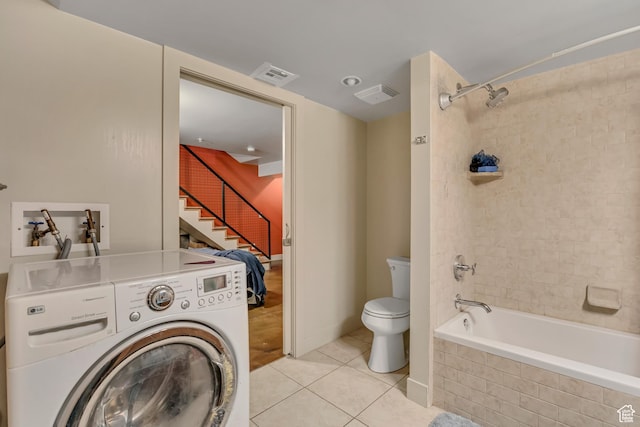 342 W 200 S Unit 107, Salt Lake City, UT 84101 - laundry room featuring washer / clothes dryer and light tile patterned flooring