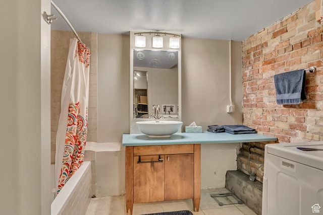 342 W 200 S Unit 107, Salt Lake City, UT 84101 - full bathroom featuring vanity, tiled shower / bath combo, tile patterned floors, and brick wall