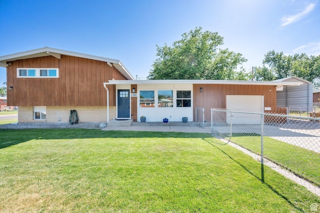 1701 N Forbes Ave W, Layton, UT 84041 - view of front of home with a garage, entry steps, driveway, and brick siding