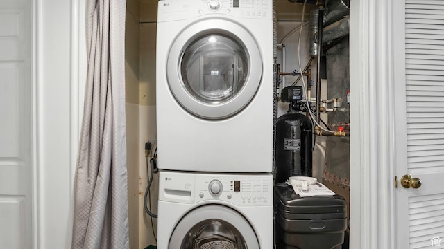 7505 S Creek Rd E, Cottonwood Heights, UT 84093 - laundry room with stacked washer / drying machine