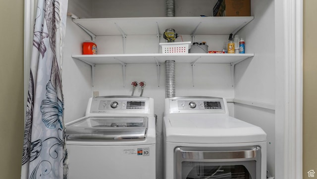 7505 S Creek Rd E, Cottonwood Heights, UT 84093 - laundry area featuring washing machine and clothes dryer